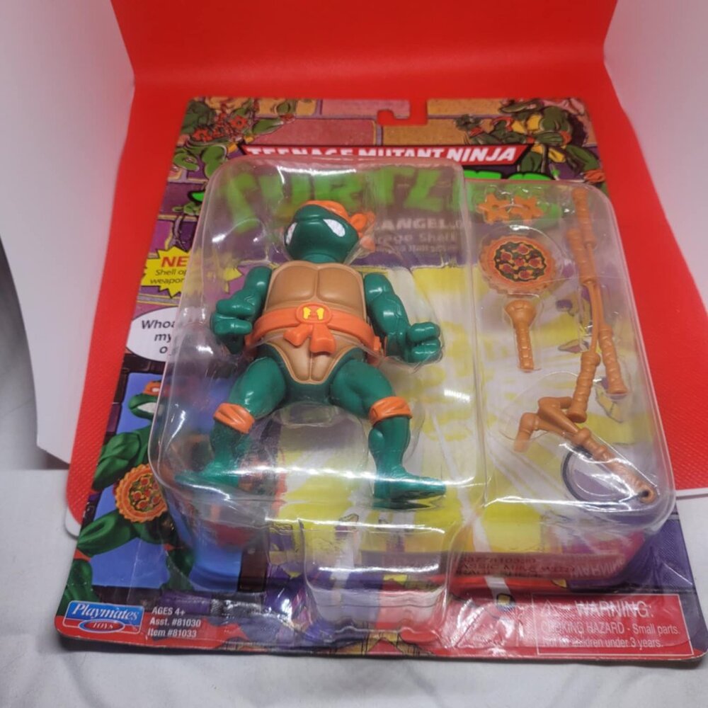 Teenage Mutant Ninja Turtles 4” Classic Storage Shell Michelangelo Action Figure